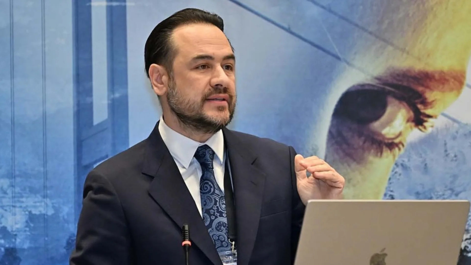 Dr. Mert Demirel at a professional meeting